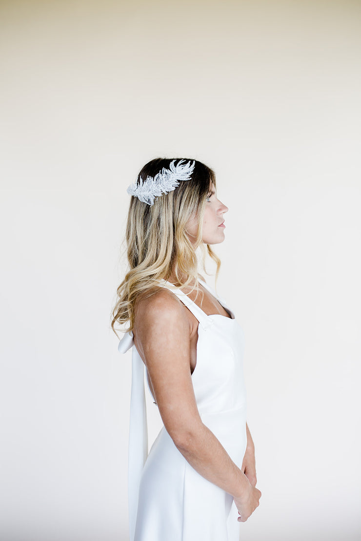 Feather shaped bridal hair accessory headpiece with white opal Swarovski crystals