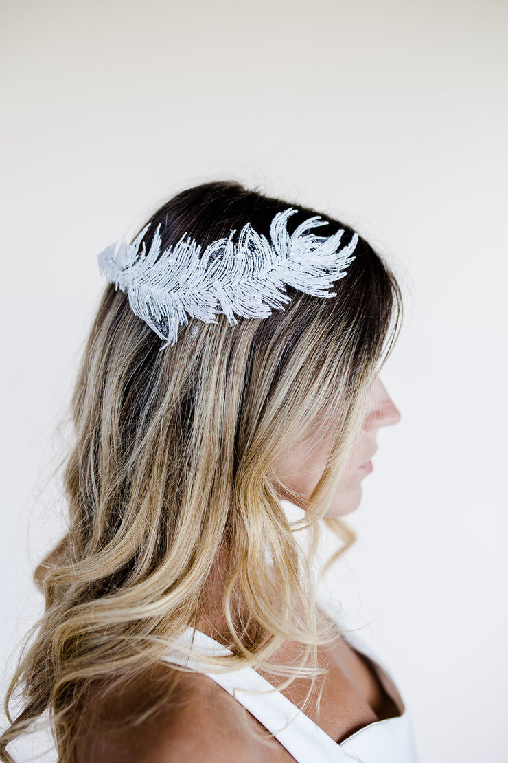 Feather shaped bridal hair accessory headpiece with white opal Swarovski crystals
