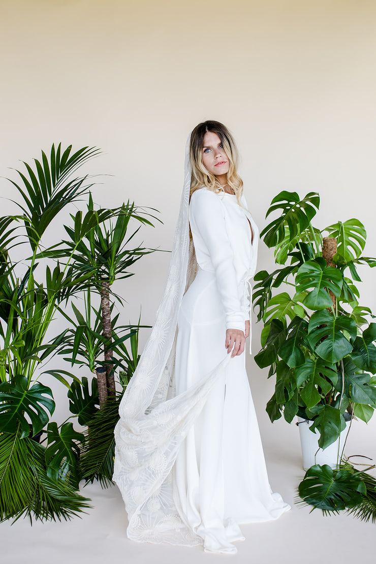 Embroidered silk wedding veil with sunburst pattern and Swarovski crystal details