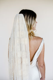Embroidered silk wedding veil with sunburst pattern and Swarovski crystal details