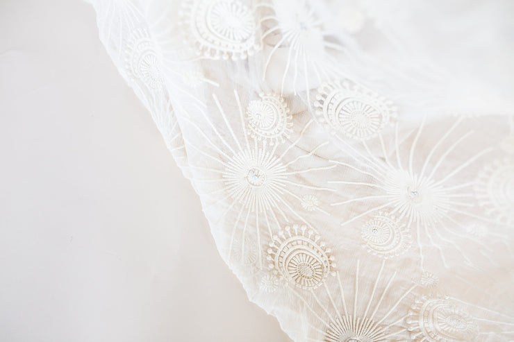 Embroidered silk wedding veil with sunburst pattern and Swarovski crystal details
