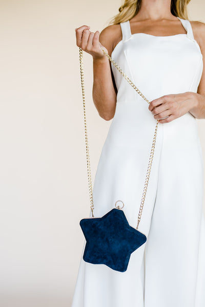 Blue suede star shaped bridal clutch bag with gold chain strap