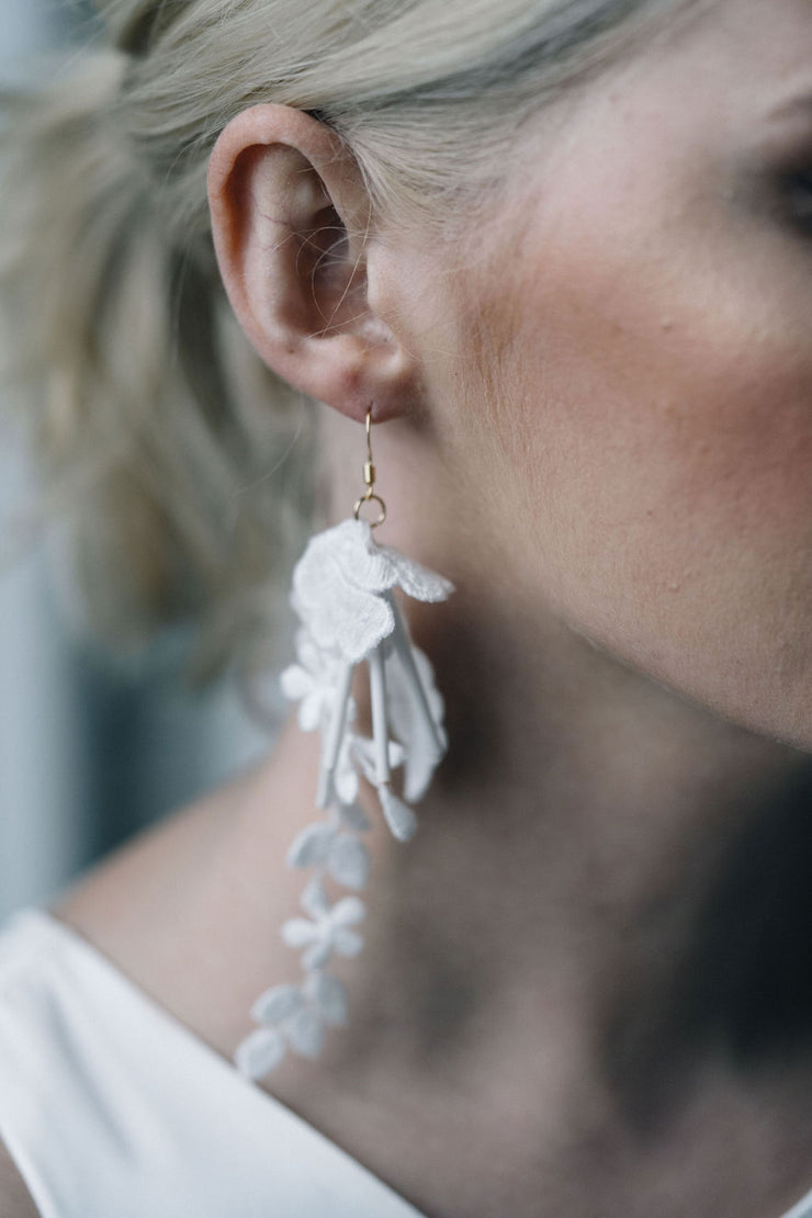 Floral lace bridal earrings with white bugle beads and gold hooks