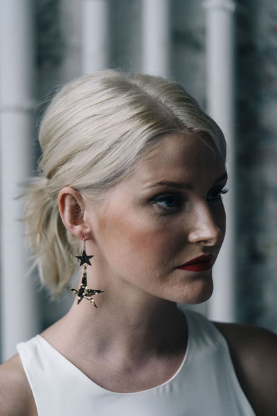 Gold star statement earrings with hammered effect
