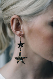 Gold star statement earrings with hammered effect